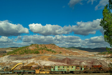 Rusted railway equipment near the scenic Rio Tinto open-pit mine
