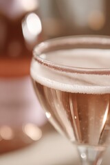 Close Up Of Rose Champagne In A Glass With Sugar Rim And Blurred
