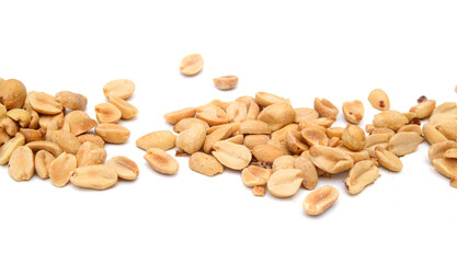 Dried peanuts in closeup on white