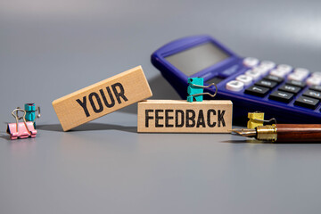 Text your Feedback matters on White Paper Background, Business concept.