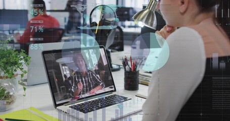 Watching woman sleeveless top resting chin viewing laptop call at open-plan office, HUD, copy space