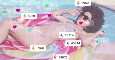 Reclining woman wearing bikini, sunglasses floating on striped float in blue pool with social icons