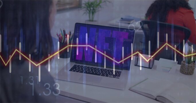 Analyzing two colleagues, one in red top viewing NFT on laptop at office desk, chart overlay