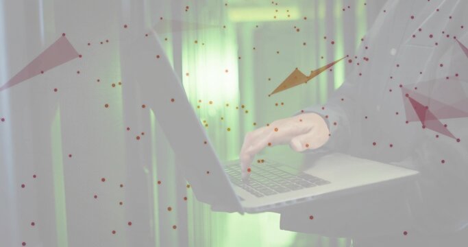 Typing on silver laptop, Korean man in server room in suit jacket, white shirt, red overlays - Powered by Adobe