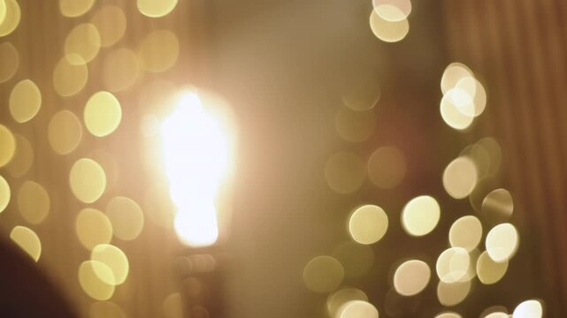 Beautiful warm bokeh of christmas lights and tree vintage feel vibes