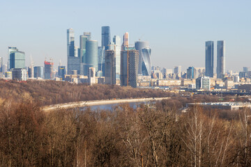 Fototapeta premium Panorama of a large modern city with skyscrapers. View of city blocks with high-rise buildings. Beautiful cityscape. Moscow, Russia.