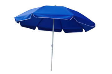 A blue beach umbrella stands upright on a sandy shore. providing shade for sunbathers. while gentle waves lap at the coastline in the background. creating a serene summer atmosphere