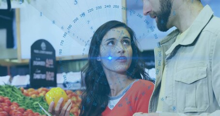 Woman holding yellow bell pepper, checking list while man scanning grocery overlay aligning face