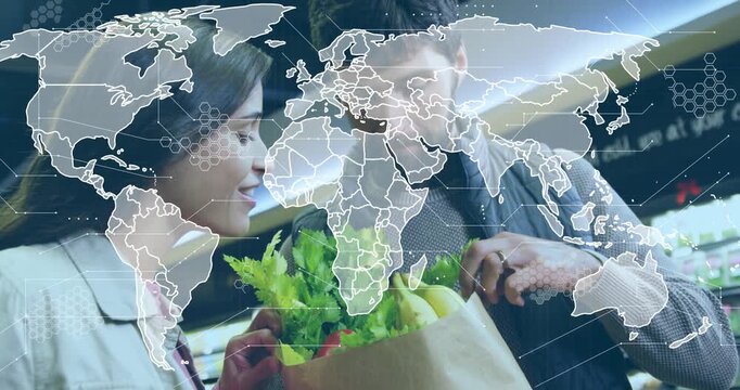 Woman reaching into grocery bag, man arranging produce for packing, map overlay shifting over bag