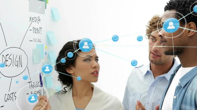 Woman tapping DESIGN mind map on whiteboard, team moving, blue overlay expanding, linking ideas