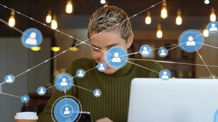 Woman at cafe glancing laptop as icon appearing network grouping expanding tapping phone linking IT - Powered by Adobe