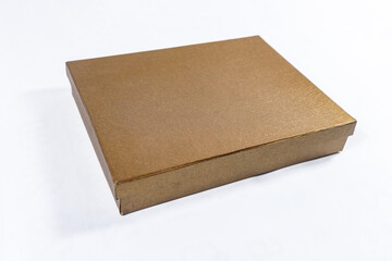 Plain metallic bronze and copper-toned gift box package present, brown square golden mockup material