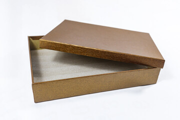 Open plain metallic bronze and copper-toned gift box package present, brown square golden mockup