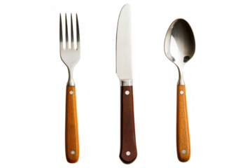 A beautifully arranged set of dining utensils including a fork. knife. and spoon with wooden handles. placed on a clean white background. perfect for table settings or culinary articles