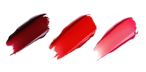 A display of three lipstick swatches in varying shades of red on a clean white background. the rich textures and colors ideal for beauty product marketing