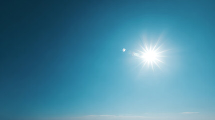 Bright sun shining in a clear blue sky, creating a serene and uplifting atmosphere of nature.