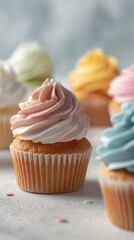 Sweet Pastel Cupcakes with Swirled Frosting and Soft Bokeh Background.