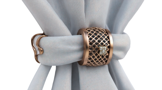 Decorative curtain tie back with intricate gold metalwork isolated on transparent background