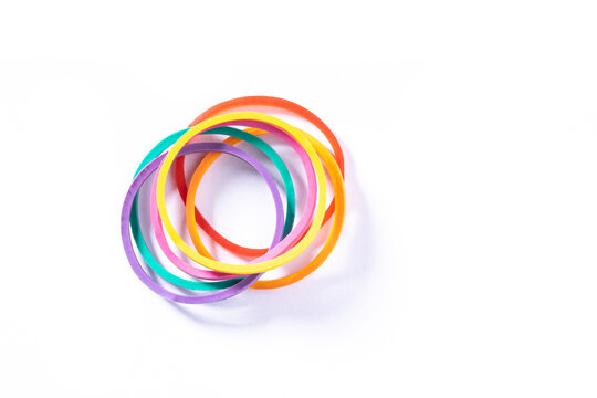 Stack of colorful rubber band on white background