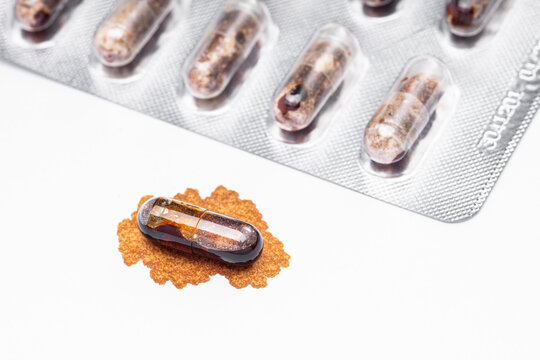 Expired medicine capsules, showing deteriorated and dissolved medicine