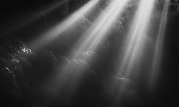 shafts of light piercing dark clouds and mist with soft glowing particles, a monochrome scene of calm, awe and mystery - Powered by Adobe