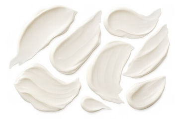White cosmetic cream smears and swatches applying skin care lotion texture, displaying beauty makeup product strokes on a transparent background