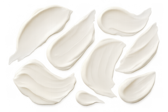 White cosmetic cream smears and swatches applying skin care lotion texture, displaying beauty makeup product strokes on a transparent background