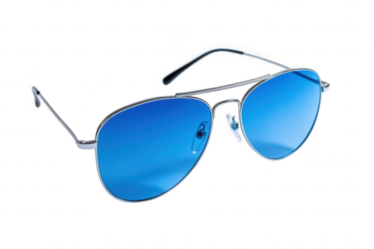 Stylish blue-tinted sunglasses with a sleek metallic frame resting on a clean white surface. their modern design and reflecting light. ideal for fashion or accessory photography