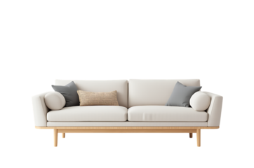 Modern white sofa with wooden legs and decorative pillows on a black background