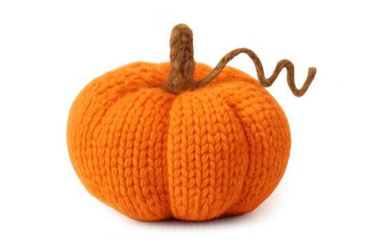 Knitted orange pumpkin decoration creating cozy autumn feeling for halloween and thanksgiving holiday backgrounds