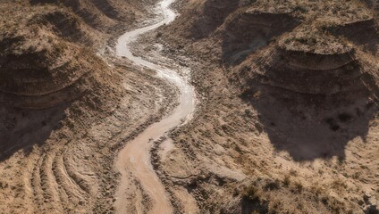 Aerial View of a Winding River Through a Desert Landscape.
