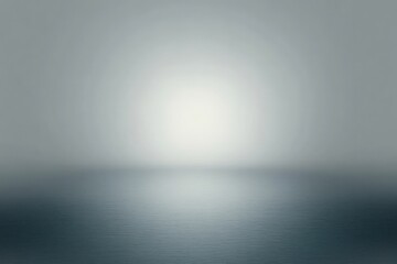 Minimal misty seascape, calm open water and soft pale light at the horizon conveying a tranquil, serene atmosphere