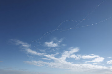 mesmerizing spectacle unfolds as flock of drones crafts stunning artistic designs in sky