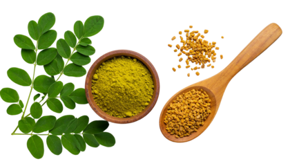 Green leaves, a bowl of powder, seeds, and a wooden spoon against a black background