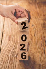 symbolize the change from 2025 to the new year 2026. 2026 happy new year concept.