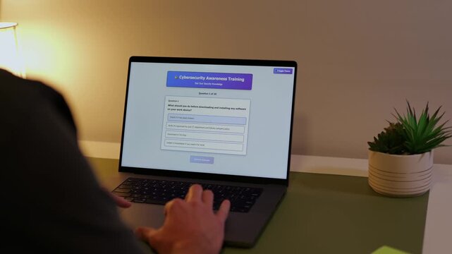 Middle Aged Man Taking Corporate Employee Information Security Awareness Training - Cybersecurity User Education Concept