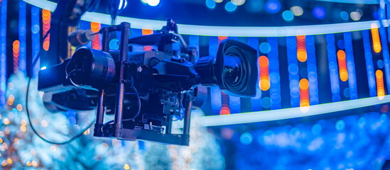 camera on the set of a Christmas TV show