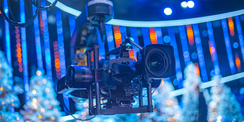 camera on the set of a Christmas TV show