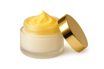 Skincare product jar featuring rich yellow cream and a detached golden cap, conveying deep hydration and cosmetic care