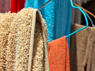 Close-up of Colorful Towels Hanging on Clothesline