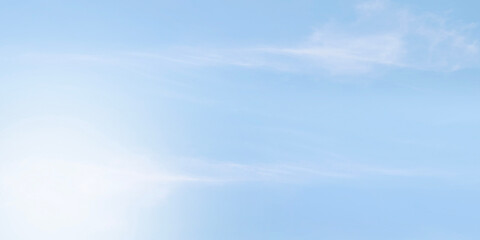 Clean soft pale blue sky with very faint almost imperceptible wisps cirrus clouds. Sky smooth gradient shifting from slightly lighter shade bottom pastel blue top. Peaceful and calm background