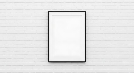 A sleek black vertical picture frame with a white matte centered on a clean white brick wall, ideal for art display mockups and modern interior design presentations.