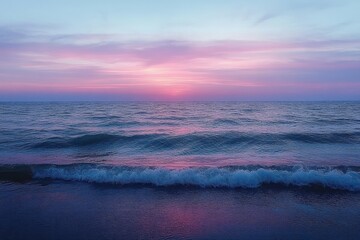 calm ocean waves lapping a shoreline under a pastel pink and purple sunset sky, serene and dreamy mood