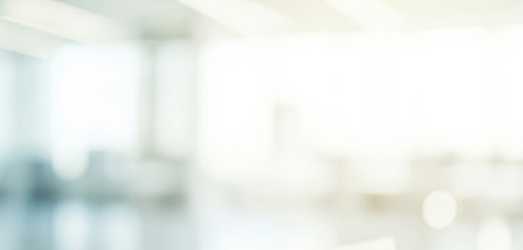 Bright abstract background with soft light and blurred interior shapes, forming a gentle glowing ambience with smooth luminous tones that feel modern, calming