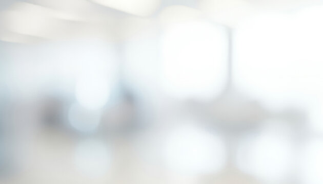 Bright white and light gray abstract background with soft focus and bokeh, forming a minimalist and elegant visual atmosphere that evokes purity and clarity, enhanced by smooth glowing highlights