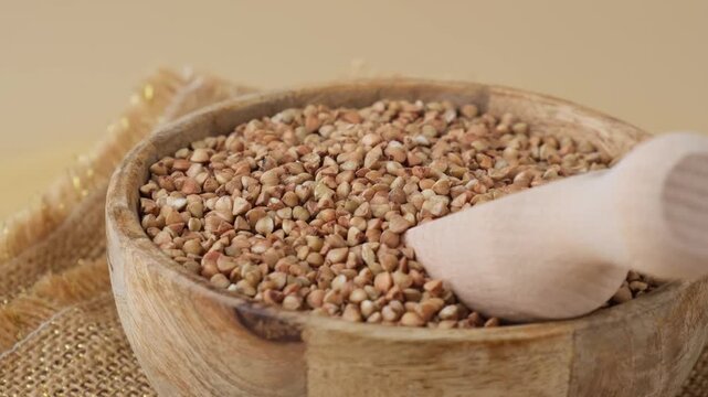 Raw buckwheat porridge Gluten free cereals. Health gut benefits. Concept of alternative whole spelt grain ingredient. Vegetarian diet recipes. Plant-based lifestyle. Copy space Protein rich eating 