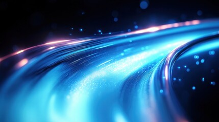 Glowing blue curved light trails and sparkling particles on a dark background conveying futuristic motion, speed and energetic flowing energy