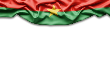 The national flag of Burkina Faso made of rippled silk fabric, isolated on a white background with copy space.
