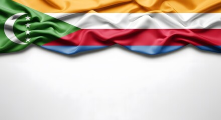 The national flag of the Comoros, rendered as a wavy silk banner at the top with a white background for copy space.
