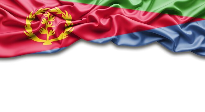 The national flag of Eritrea made of silk fabric, waving on a white background with copy space.
